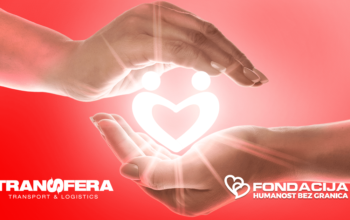Two open hands gently forming a protective shape around a glowing heart-shaped symbol on a red background, representing care, support, and humanity, with Transfera and Humanity Without Borders logos visible.